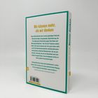 "Wir können mehr, als wir denken." Buchrückseite mit Text über Herausforderungen und Lösungen, grün umrandet.