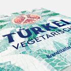 Türkei Vegetarisch. Brandstätter. Hintergrund: grüne Mosaikstruktur mit einem Granatapfel.