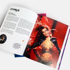 Text: "CYPRUS", "CAPITAL: NICOSIA", "FIRST PARTICIPATION: 1981", "FUN FACT: IN TERMS OF NUMBER OF APPEARANCES...". Enthält Bild einer tanzenden Sängerin.