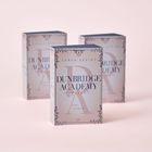 Das Bild zeigt drei Bücher mit dem Titel "Dunbridge Academy: Whoever" von Sarah Sprinz, verziert mit floralen Mustern.