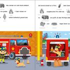 Ein Feuerwehrmann und ein Hund bereiten sich neben einem Feuerwehrauto mit Ausrüstung auf einen Einsatz vor.