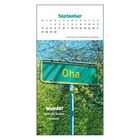 September-Kalender, "Oha" gelbes Schild, grüner Hintergrund. Text: "Wunder gibt es immer wieder."