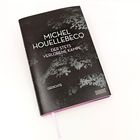 Das Buchcover zeigt: „Michel Houellebecq: Der stets verlorene Kampf, Gedichte“. Schwarzer Hintergrund mit grauen Mustern.