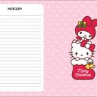 Text "NOTIZEN" links, "Merry Christmas" auf rotem Socken. Illustration mit niedlichen Figuren auf rosa Schneeflockenhintergrund.