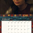Februar, Kalender, Tage mit Karnevals- und Valentinsmarkierungen, darunter eine Illustration von jemandem auf einem Drachen.
