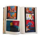 Seitenzahl 172-173, Wort "ORANGE". Fotos von bunten Stoffen und Menschen in farbenfrohen Kulissen.