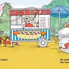 „… mag erst ein heißes Würstchen kaufen.“ „Die anderen rasen, laufen, sausen. Alle Tiere? Nein! Eins …“ Ein Tier an einem Hotdog-Stand.