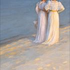 Kalenderseite mit dem Monat "2" und Jahr "2027". Zwei Frauen in weißen Kleidern am sandigen Strand, Blick aufs Meer.