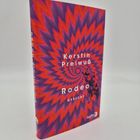 Text: "Kerstin Preiwuß, Rodeo, GEDICHT". Cover mit rot-blauem, spiralförmigem Muster.
