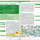 "Ausgehen & Feiern" und Hinweis auf Adressen auf der Faltkarte. Abendliche Szene in einer belebten Altstadt mit beleuchteten Gebäuden.