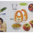 "Guten Appetit! Es ist Zeit für das Mittagessen. Was möchtest du?" Verschiedene Speisen und Besteck sind abgebildet.