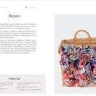 "Rosen", Stoffrosen aus Resten, vielseitig. Material: Stoffreste, Buttons, TPU-Bänder. Korb mit bunten Stoffrosen.