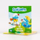 Auf einem Comic-Cover steht "DIE SCHLÜMPFE" und "DIE WETTER-MASCHINE". Ein Schlumpf auf Skiern und ein Schlumpf in Badehose, Illustration.