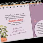 Zwei Textseiten auf einem Spiralaufsteller. Links plant, rechts Herz-Info. Texte motivierend und mit positiver Botschaft.