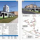 VITORIA-GASTEIZ. Zwei Straßenbahnen auf Gras. Karte zeigt Streckennetz mit Haltestellen. Informationen auf Deutsch und Englisch.
