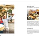 "INTERVIEW MIT TOMEU ARBONA" steht unten links. Rechts: Zwei lachende Personen mit einem großen, gepuderten Kuchen.