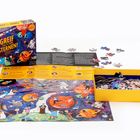 "Greif nach den Sternen!" Puzzle-Schachtel und Teile, bunte Illustrationen von Astronauten und Weltraumobjekten.