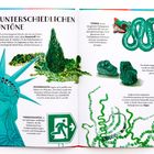 "Die unterschiedlichen Grüntöne. Grünstichige Illustrationen der Freiheitsstatue, einer Pflanze, eines Drachens und Algen."