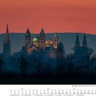 Kalenderblatt für Februar 2027, darunter der Dom von Speyer in Dämmerungslicht, am Horizont Berge und ein Sichelmond.