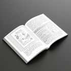 Linke Seite: Diagramm mit Titel "Annuität". Rechte Seite: Text und Tabelle mit dem Titel "Dennoch...". Buch auf schwarzem Untergrund.