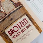 Text: "BROTZEIT. TISCHLEIN DECK DICH. So bringt ihr Abwechslung auf den Tisch." Mehrere Brotscheiben auf Holzbrett.