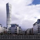 Text: "Stadtbild Malmö 2". Kalender unten. 
Hochhäuser mit einem verdrehten Turm im Hintergrund, bewölkter Himmel.