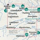 Text: "KOMPASS" oben links. Zwei Hände zeigen auf eine ausgebreitete Landkarte auf einem Holztisch.