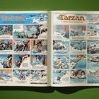 Comic mit dem Titel "Tarzan" von Edgar Rice Burroughs. Dynamische Abenteuer in einem Fluss mit Tarzan und anderen Figuren.