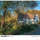 Kalender: November 2027, Allerheiligen am 1., Volkstrauertag am 14. Dürscheider Mühle bei Burscheid, umgeben von Herbstlandschaft.