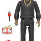 Eine Figur in schwarzer Kleidung, roter Weihnachtsmütze, mit Mikrofon, Geldscheinen, und einem Sack mit Dollarzeichen.