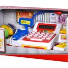 Spielkasse mit "TOTAL" auf Display, Spielgeld, buntem Scanner und Früchten in einer Verpackung.