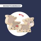 "Beidseitig bedruckt" steht oben. Zwei Holzfiguren einer Ziege mit lächelndem Gesicht und rotem Pfeil.