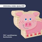 "Original HABA-Qualität", "FSC®-zertifiziertes Buchenholz". Holzspielzeug-Schwein, freundlich und bunt illustriert.