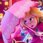 Eine blonde Figur in pinkem Kleid hält einen rosa Schirm mit Spitze, umgeben von bunten, lebhaften Formen.