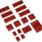 Texte: "You are the best!", "Happy Day". Rote Gummistempel mit verschiedenen Mustern.