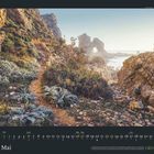 Kalendarium für Mai mit Pfaden durch felsige Landschaft bei Sonnenaufgang. Logo "GEO" unten rechts.