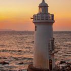 Mai-Kalender mit Leuchtturm im Sonnenuntergang. "GEO"-Logo unten links.