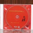 Auf einem CD-Set steht links ein Dankestext, in der Mitte eine rote CD „Love is real“, rechts eine blaue CD „S’il amour existe“.