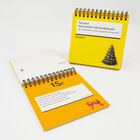 "Reclams literarischer Adventskalender" mit Weihnachtsbaum, gelber Aufsteller. Offene Seite mit Gedicht und roter Schleife.