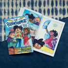 Comic-Titel "The Brainstormerz: Money Talks". Drei fröhliche Kinder mit lebhaften Farben auf dem Cover.