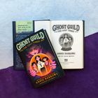 "Ghost Guild: The Lost Three" von Annie Barrows. Illustrationen zeigen drei Kinder und eine Frau mit Kristallkugel.