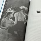 "TUES" in großen Buchstaben. Schwarz-weiße Illustration: Drei Personen im Gespräch, eine kniet, umgeben von mysteriösen Elementen.