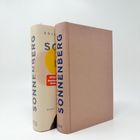 Zwei Bücher, ein Buch hat den Titel "SONNENBERG". Auf dem Schutzumschlag steht "SPIEGEL Bestseller Autor".