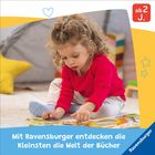 Ein kleines Kind im roten Pullover erkundet ein Buch am Boden. Oben "ab 2 J.", unten Slogan von Ravensburger.