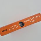 "DEIN LETZTES FEST", Autor: Jason Rekulak. Buchrücken in kräftigem Orange, schlichtes Design.