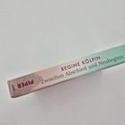 Buchrücken mit Text: "Regine Kölpin - Zwischen Abschied und Neubeginn." Verlagsname: "Piper". Heller Hintergrund.