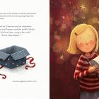 Eine Karte rät: Träume und Wünsche sind Schätze, hör nie auf zu wünschen. Daneben ein geöffnetes Geschenk mit Schleife.