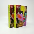 "Das erste Licht des Sommers", Daniela Raimondi, ullstein. Zwei Bücher mit buntem Porträt auf dem Cover.