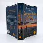 KLAUS-PETER WOLF, Sommerfeldt SOLO, DER AUFTRAG. Zitat: „Ihr glaubt, der Doktor ist auf der Flucht?" Strand bei Sonnenuntergang.