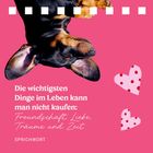 Text: "Die wichtigsten Dinge im Leben kann man nicht kaufen: Freundschaft, Liebe, Träume und Zeit. Sprichwort." Ein Hund kopfüber; rosa Hintergrund mit Herzen.